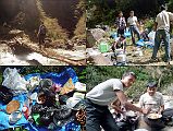 106 Lunch At Tangdung Khola We arrived at our lunch spot next to the Tangdung Khola (2450m) at 10:40, 3 hours from Lete. �We now took a path along the side of the cliff and after a steep descent found ourselves suddenly beside the Chadziou Khola� (Maurice Herzog, Annapurna). The porters rolled out a tent sleeping bag sheet on the ground out of the sun, and I rested as they busily made lunch: hot orange Tang, French fries, coleslaw, yak cheese and puri (bloated deep fried bread). What did the boys have, you ask? Why dhal bhat of course. They have it twice a day - lunch and dinner. Lunch was over at 12:15.